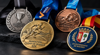 Medallas metálicas personalizadas a medida con acabados en oro, plata y bronce, relieves, esmaltes y cintas para eventos deporti Medallas metálicas personalizadas a medida con acabados en oro, plata y bronce, relieves, esmaltes y cintas para eventos deporti